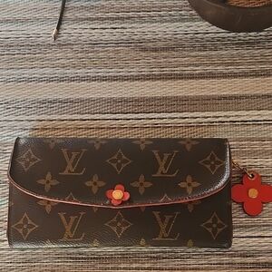 Louis Vuitton Brown Monogram Clutch with Red Flower Charm